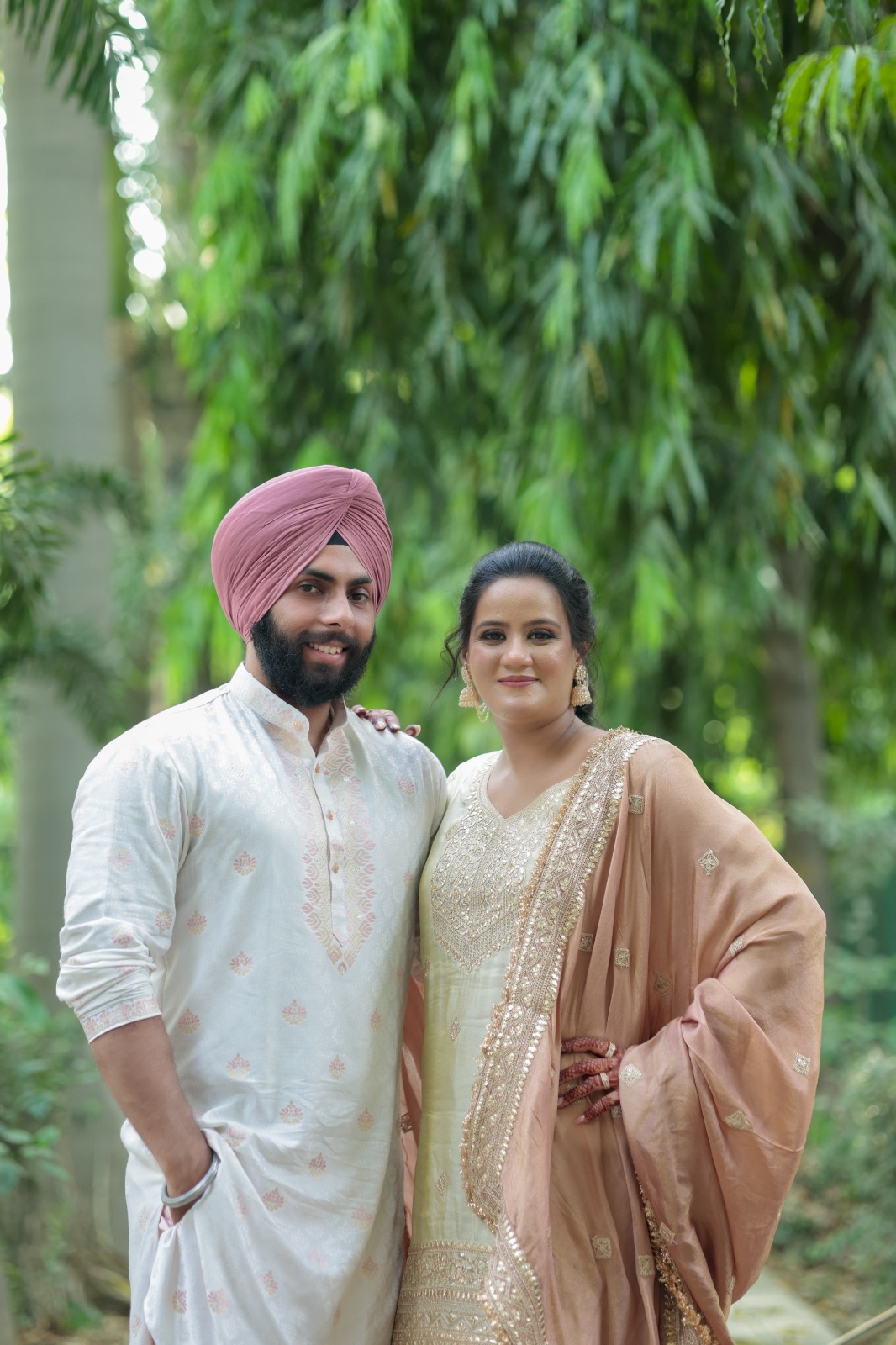 The couple among the trees